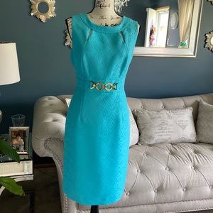 Turquoise colored dress. Perfect for a wedding or work